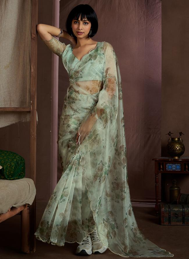 Soft Organza Pista Green Traditional Wear Zircon Border Saree